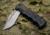 K25 Tactical Folding Knife, 4.75in Closed, 3.5in Gray Titanium Coated Stainless Drop Point Blade, Black Rubberized Synthetic Handle, Nylon Belt Sheath, 19581